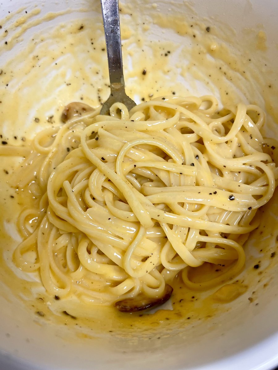 Farmers market pasta, a head of roasted garlic, 2 cups of micro planed Parmesan and 4 raw organic egg yolks = the easiest most delicious "Mac and cheese" (this photo doesn't do the color justice but it's pretty dang orange from the bright yolks) 

*generous ground black pepper