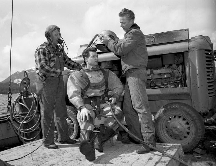 ANC_Historian's tweet image. April 14, 1954, diver W.E. "Winkie" Walker and his fabulous hair around Ketchikan. Via Tongass Historical Museum. #alaskahistory #alaska