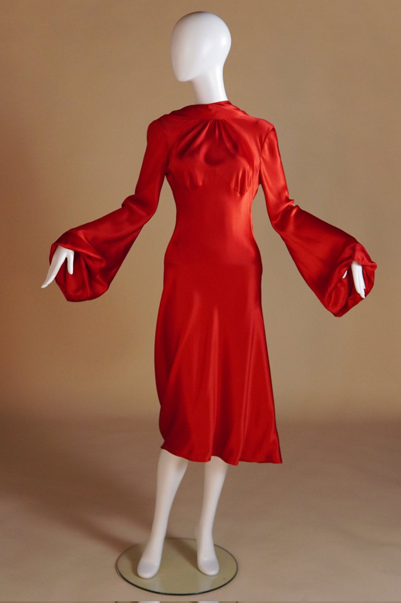 forbrittain's tweet photo. such a perfect piece in this week's vintage drop, this Pre-Fall 2009 Alexander McQueen red draped silk dress w the open back. shown in black velvet in the presentation, &amp; basically a re-interpretation of a dress he did for F/W 2004. what an addition to a wardrobe. now available https://t.co/94dfI5Dpvj