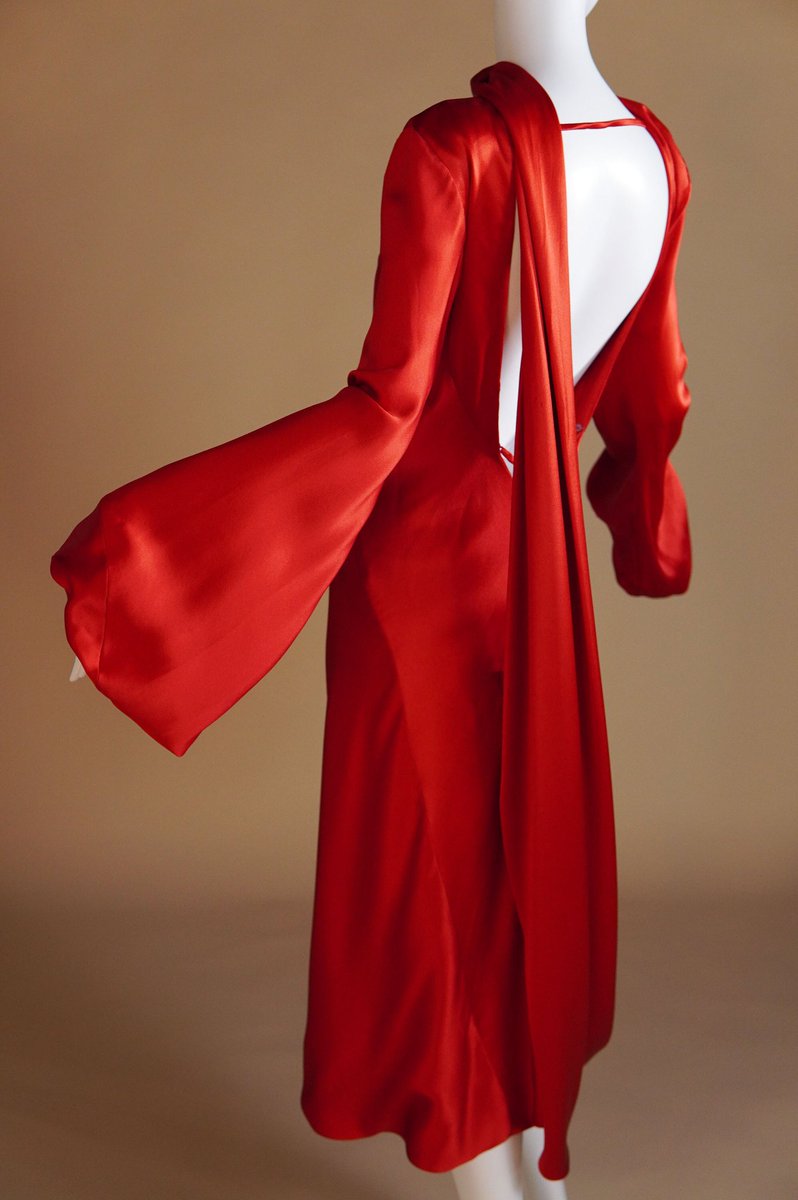 forbrittain's tweet photo. such a perfect piece in this week's vintage drop, this Pre-Fall 2009 Alexander McQueen red draped silk dress w the open back. shown in black velvet in the presentation, &amp; basically a re-interpretation of a dress he did for F/W 2004. what an addition to a wardrobe. now available https://t.co/94dfI5Dpvj