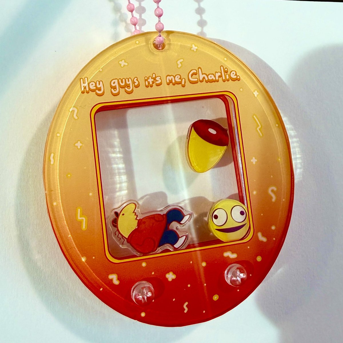 fiaphobe's tweet image. smiling friends tamagotchi keychains i designed