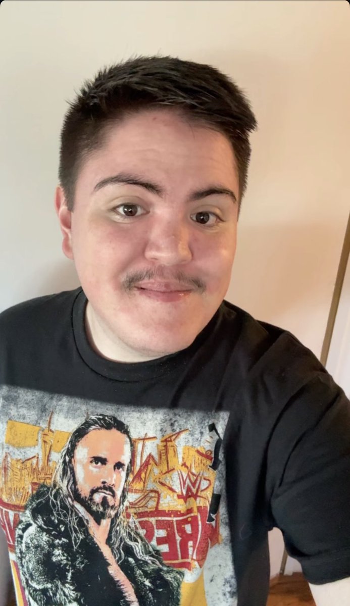 isaacmultimedia's tweet photo. Rocking my brand new #wrestlemania 42 Seth Rollins Card T-Shirt from Hot Topic! 😎🔥 https://t.co/gFba9k8CRJ