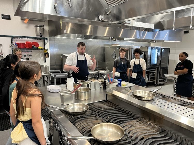 NHSBraves's tweet photo. Spanish 1 ACP students visited the SCCC Culinary Institute today. Students reviewed food and kitchen vocabulary in Spanish while Chef Martin instructed students on how to prepare authentic paella. https://t.co/6xxwoOJCbf