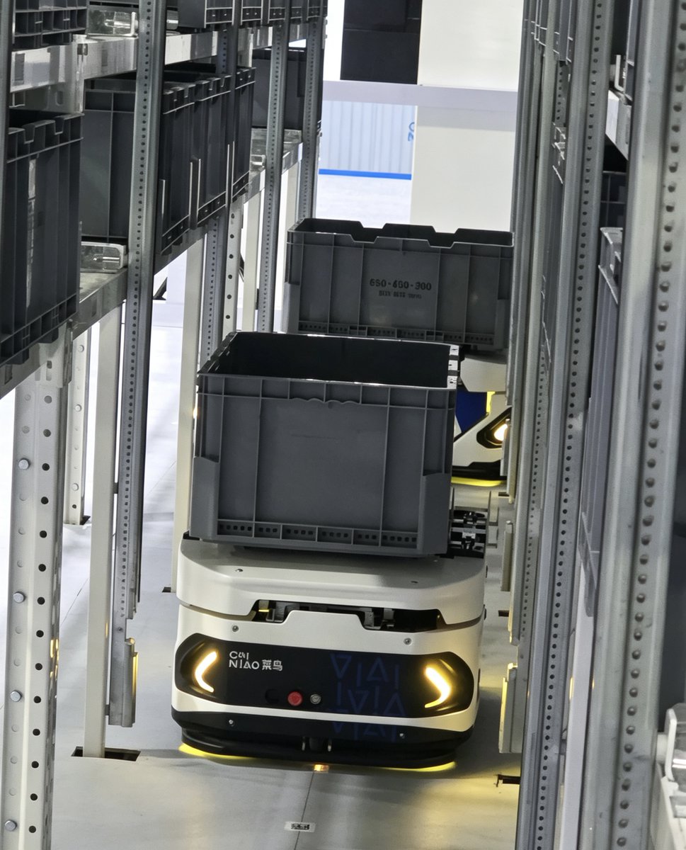 OfficialCainiao's tweet photo. Now introducing our latest innovation in warehouse operations! We’re bringing something exciting to this year’s #MODEX: ZeeBot, Cainiao’s first self-developed climbing warehouse #robot. Climb racks up to five stories in as little as 10 seconds! https://t.co/Bqxihl46Ln