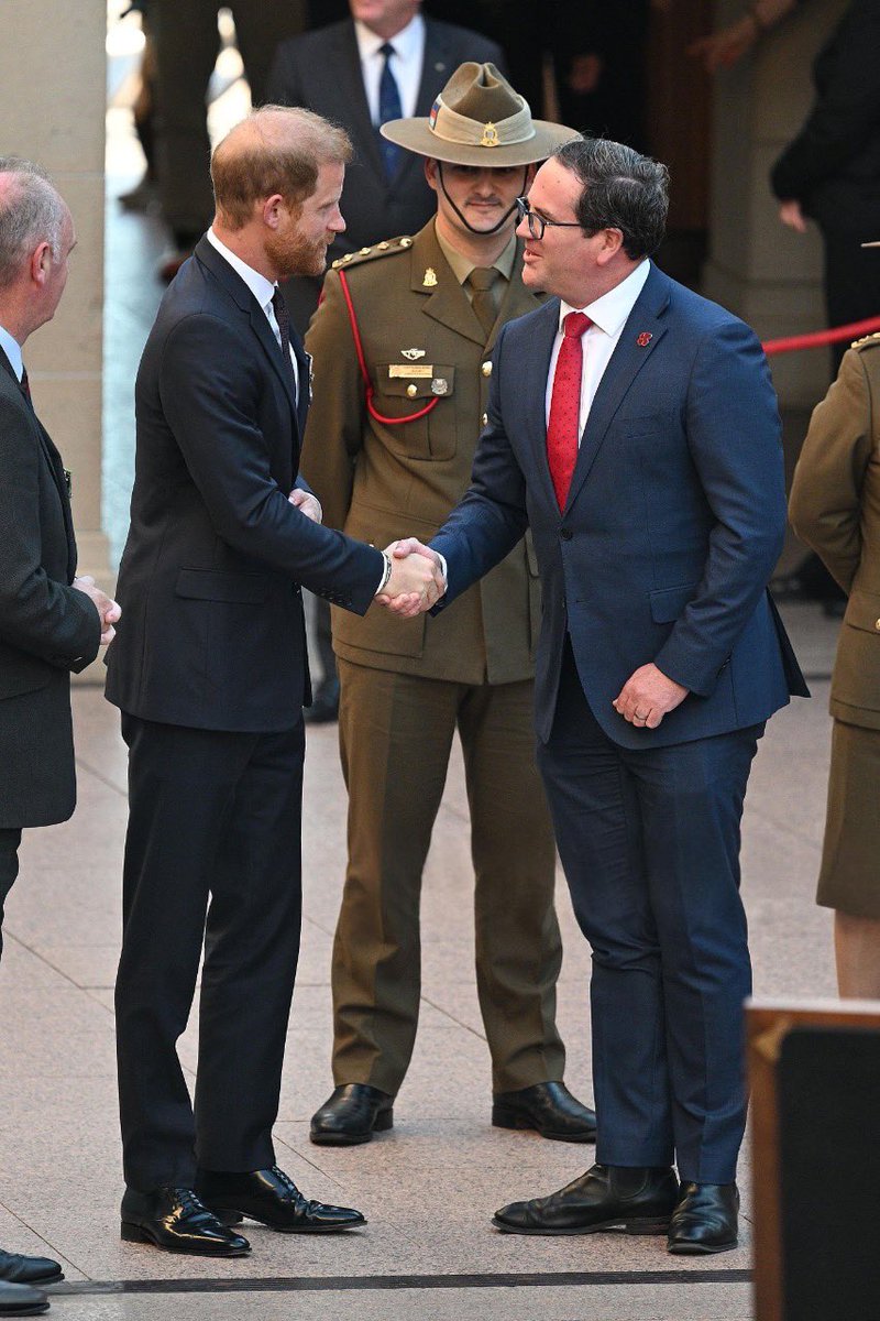 Prince Harry, Duke of Sussex greets Matt Keogh, Minister for Veterans' Affairs of Australia at a Last Post Ceremony to honor fallen soldiers. 

#HarryandMeghaninAustralia