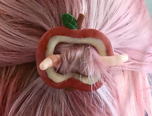 crusty photos but here's the apple hair slider i made 🍎🪱
