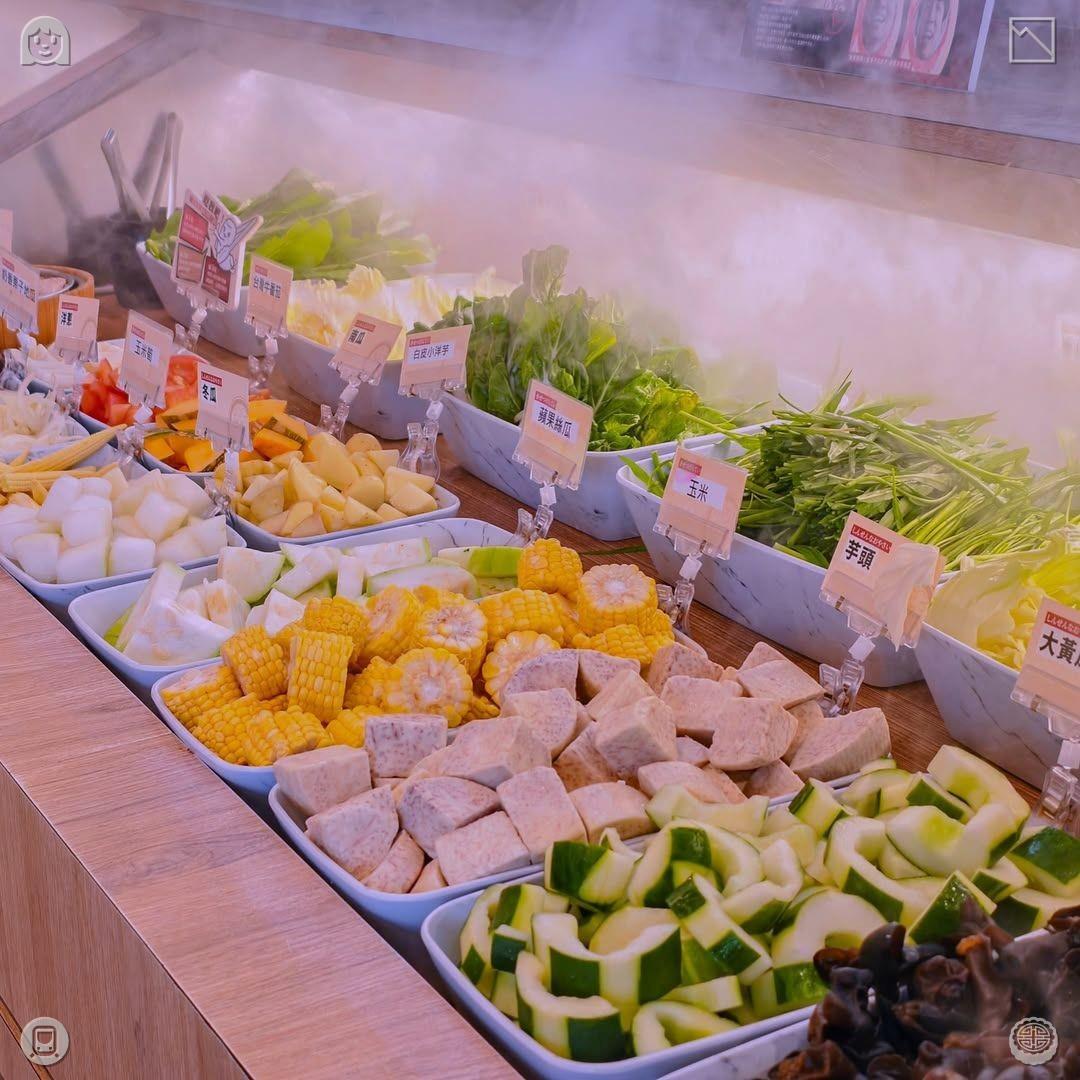 The dog walks along the chilly water.