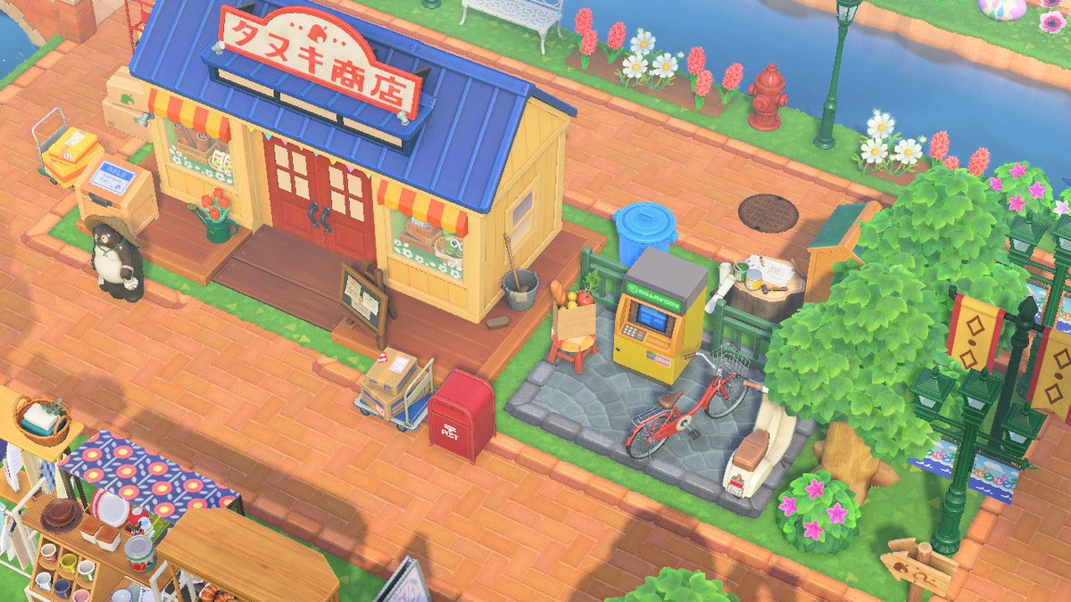 mikko_inforest's tweet image. タヌキ商店と駐輪場🚲🛵🍃

 #あつ森 #ACNH