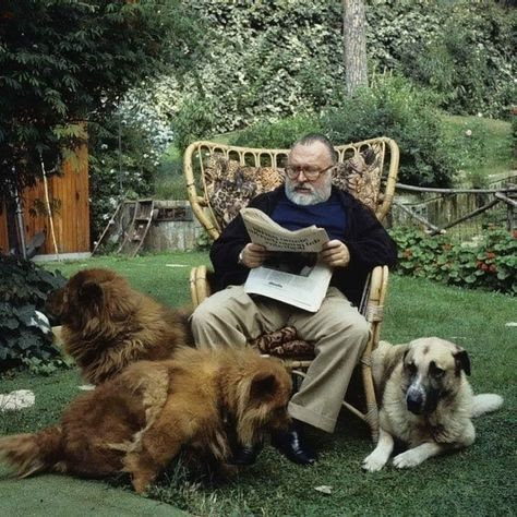 Italian director Sergio Leone with his dogs.