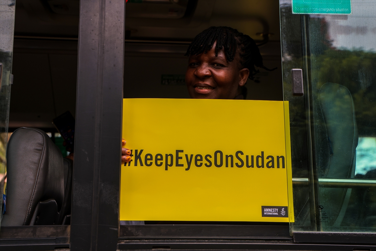 sudanaxis's tweet photo. People gather to mark the third anniversary of the war, between the Sudanese Army and the RSF started on April 15, 2023, in Nairobi, Kenya on April 15, 2026. Carrying signs reading “Keep Eyes on Sudan,” participants called for Sudan to remain on the global agenda and for an end to the war. #KeepEyesOnSudan