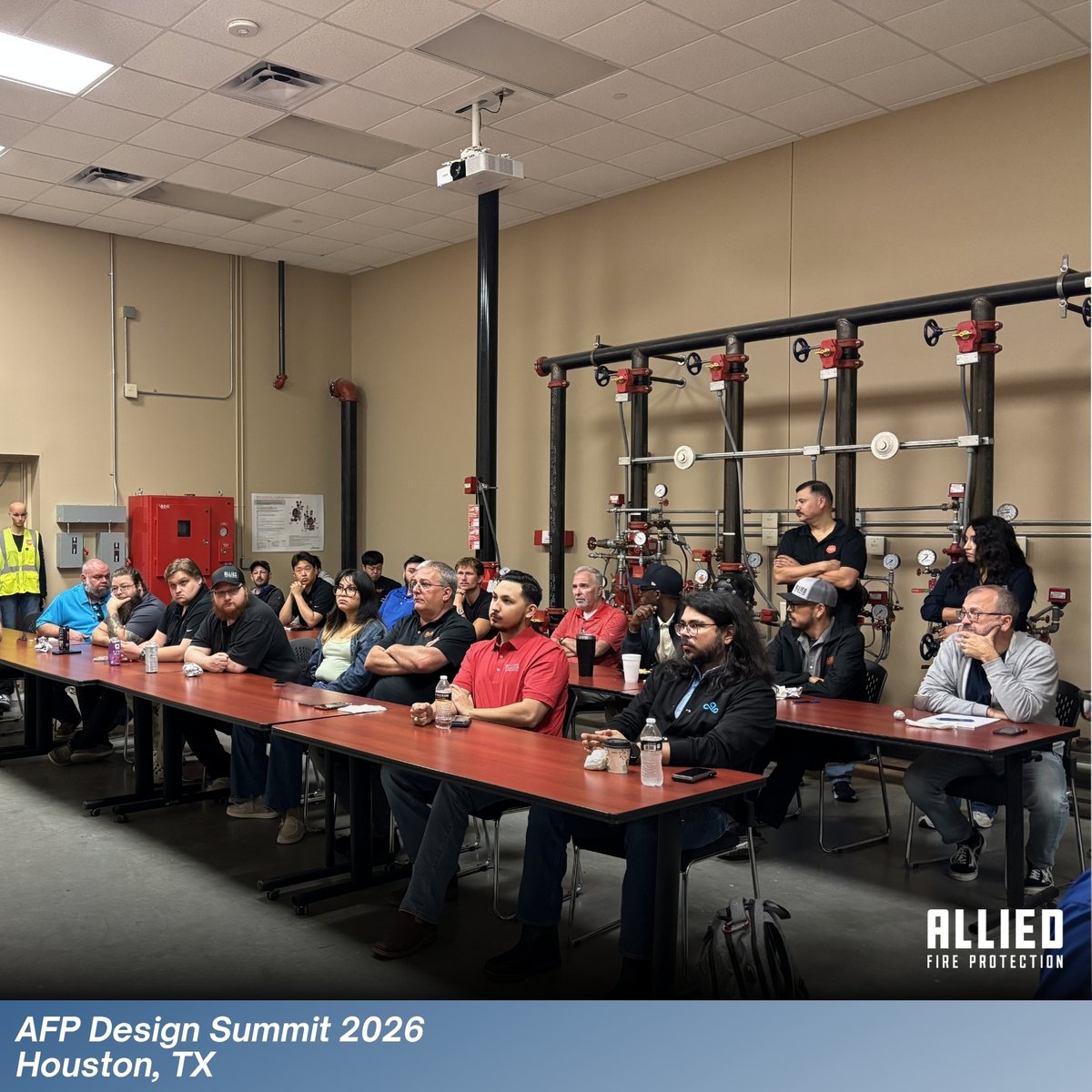 AlliedFirePro's tweet photo. Earlier this month, our Allied Fire Protection design team came together for our annual Design Summit. The event brought together 37 team members from across all Allied locations, and across the country, for a few days of focused training, collaboration, and connection.

This year’s focus centered on strengthening fundamentals, with sessions covering NFPA 13 (2025) updates, ESFR design, obstruction analysis, water storage calculations, and more. Each of our design leads shared their expertise, helping drive consistency across both our new construction and remodel teams.

We also stepped outside our comfort zones with a team-building experience at Game Show Studio, where the competition matched the collaboration and brought plenty of energy, laughs, and friendly rivalry.

Each year, this summit continues to elevate our standards and strengthen our team—and this year was no exception.

#AlliedFireProtection #DesignSummit #TeamAllied #ProfessionalDevelopment #ContinuousImprovement #TeamBuilding #WeAreAllied