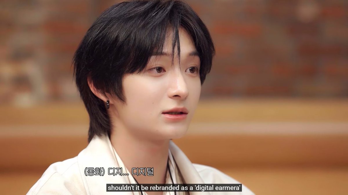 femjinyu's tweet image. mini digicams as earrings... girl you have a missed call from vogue