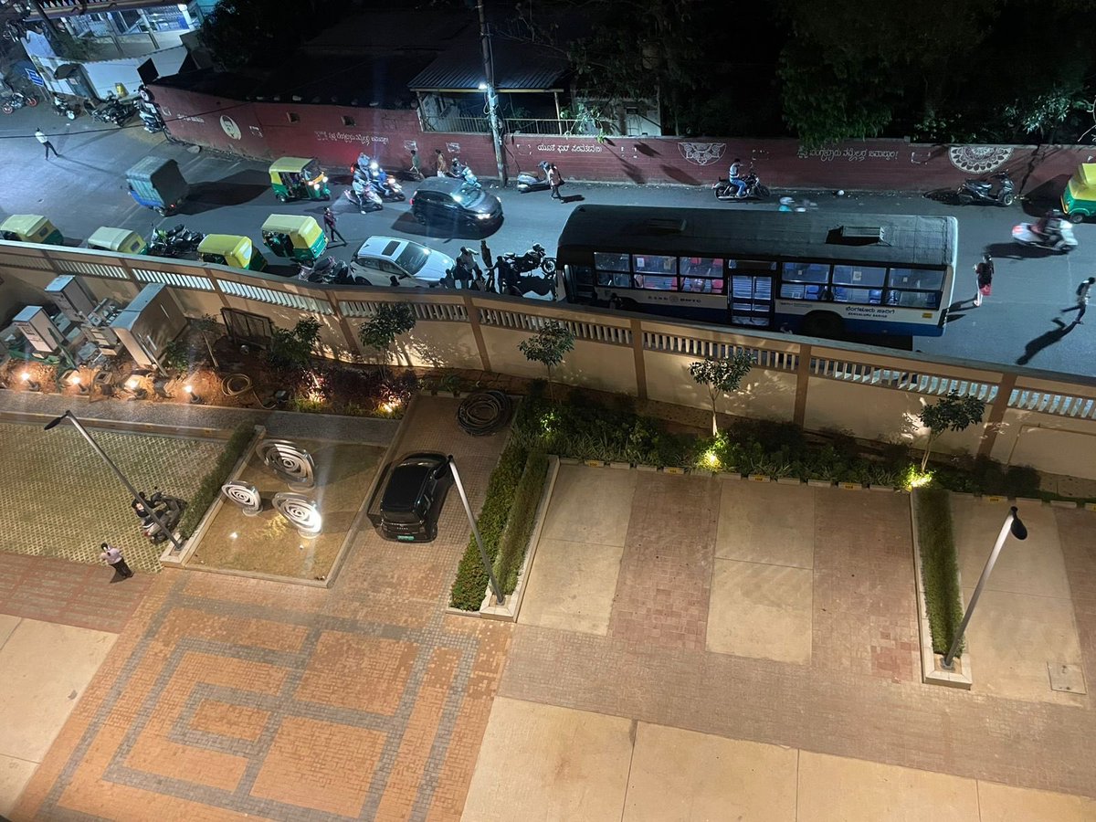 ViraKarshan's tweet photo. The road near Shani Mahatma temple, ChikkalaSansdra (near Brigade Apartments)has become a parking spot . This is blocking the road and causing traffic issues.  @BlrCityPolice Sir Can you please check so something about it…please 🙏 https://t.co/yc8UbqNgOC