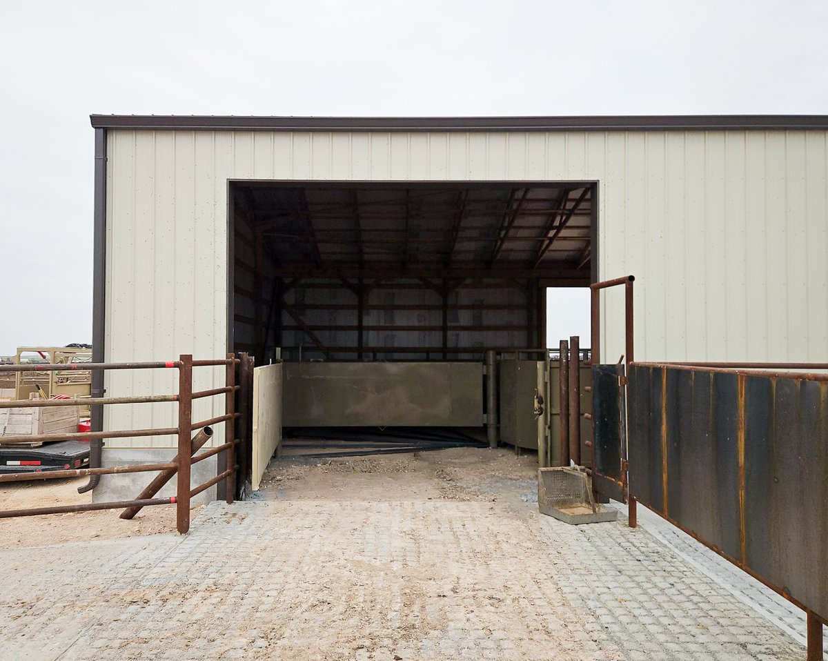 VapConstruction's tweet photo. 🚧 Built for cattle operations, this 36'x80'x12' post frame building is coming together in Eckley, Colorado. Stone-colored siding, burnished slate trim, multiple overhead doors, and heavy concrete work set it up for real, day-to-day use. See more at https://t.co/TQm9szdl14. https://t.co/quDQuBw2zW