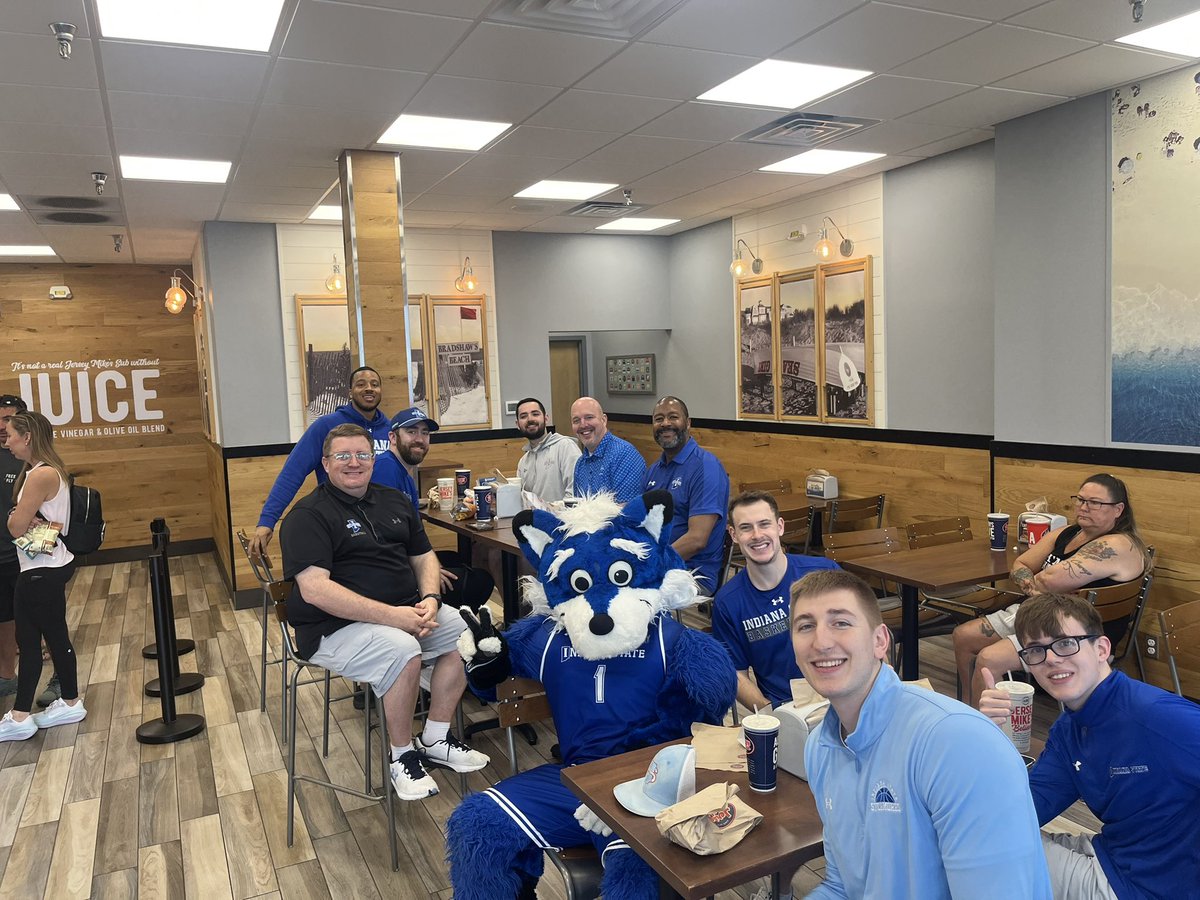 IndStBasketball's tweet photo. Head coach Matthew Graves and staff with Sycamore Sam at Jersey Mike’s in support of the Sycamores for #GiveToBlue26!

Make sure to stop by as a portion of the day's proceeds go back toward @IndStAthletics and our student-athletes!  

#MarchOn https://t.co/hkjJ1KoQBP