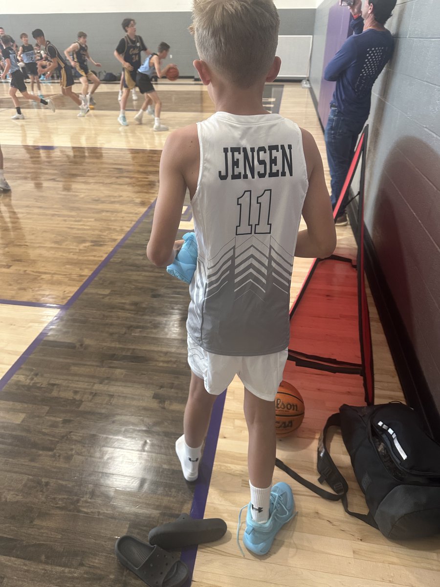 RileyJensen's tweet photo. Last week we arrived five minutes late to my 11-year-old son’s Under Armour game. It was a #ParentFail to the max in my opinion. I was a little shook about showing up late if I am being honest. 
He didn’t let it phase him at all. He hustled straight to the bench, locked in to support his teammates. When the coaches called his name about a minute later, he stepped onto the court completely present. Hit a 3 pointer with a couple of gritty layups in about 2 minutes. But this wasn't about the outcomes...it was about his presence.
In that moment something shifted in me. 
I wasn’t thinking about the score, the next play, or anything outside the gym. I was simply there, in the moment, fully present— watching my son be exactly who he is: smart, kind, driven, a great teammate, and fully alive in the moment. 
A wave of gratitude and pure joy washed over me. It felt spiritual, like the Good Lord handed me a brief, perfect window into something bigger than the game. 
As someone who coaches athletes and leaders on mental performance and presence, I spend my days teaching others how to access that state. 
My son taught the lesson to me in less than 2 minutes.
He didn’t have to do anything special. He just showed up completely. And because he did, I could too. 
If you’re a parent, maybe this lands for you the way it did for me: the deepest moments with our kids aren’t planned. They arrive when we let ourselves meet them in the present. 
I’m carrying that feeling with me this week. 
What’s one moment lately where your child’s presence pulled you fully into the now? I’d love to hear it below.
#MentalPerformance #Presence #Gratitude #YouthSports #Parenting