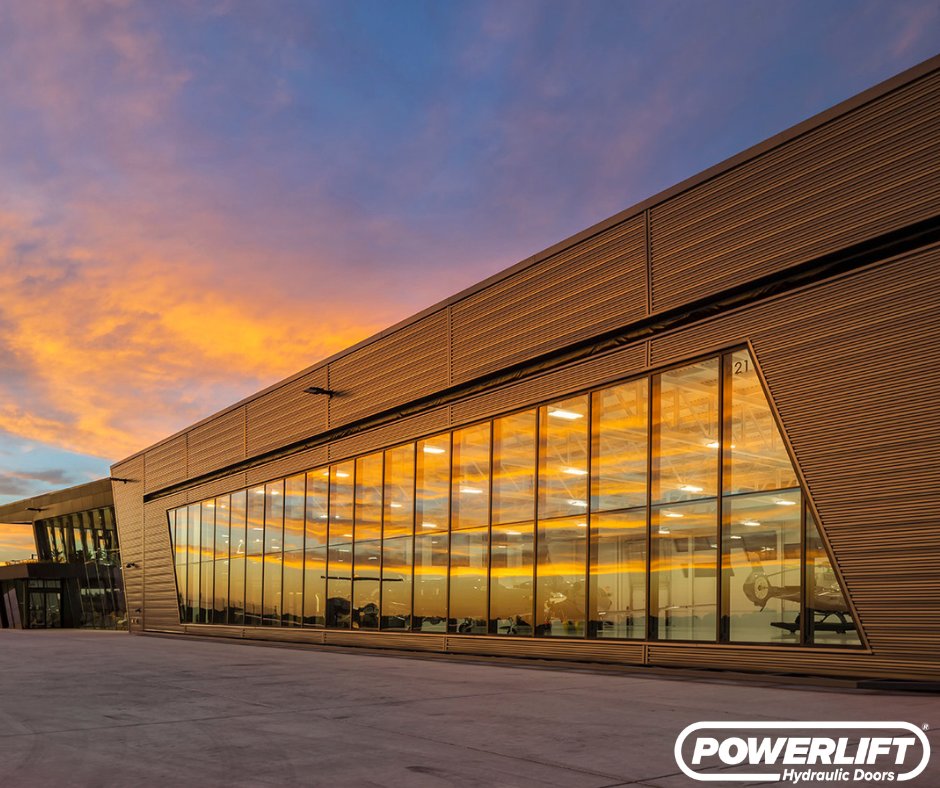 DoorsPowerlift's tweet photo. This massive 118' x 23' PowerLift Hydraulic Door delivers both scale and style for Otter Air Services in Grand Rapids, Michigan. Designed to provide full, unobstructed access while doubling as a striking architectural feature, this hangar door performs just as impressively as it looks.

From sunrise reflections to a fully open hangar ready for action, this door transforms the entire space.

Completed by PowerLift Doors of Michigan, bringing strength, precision, and craftsmanship to every project.

Looking to upgrade your hangar? Let’s make it happen.

#PowerLiftDoors #AircraftHangar #Aviation #HydraulicDoor #Michigan #OtterAirServices #BuiltByPowerLift