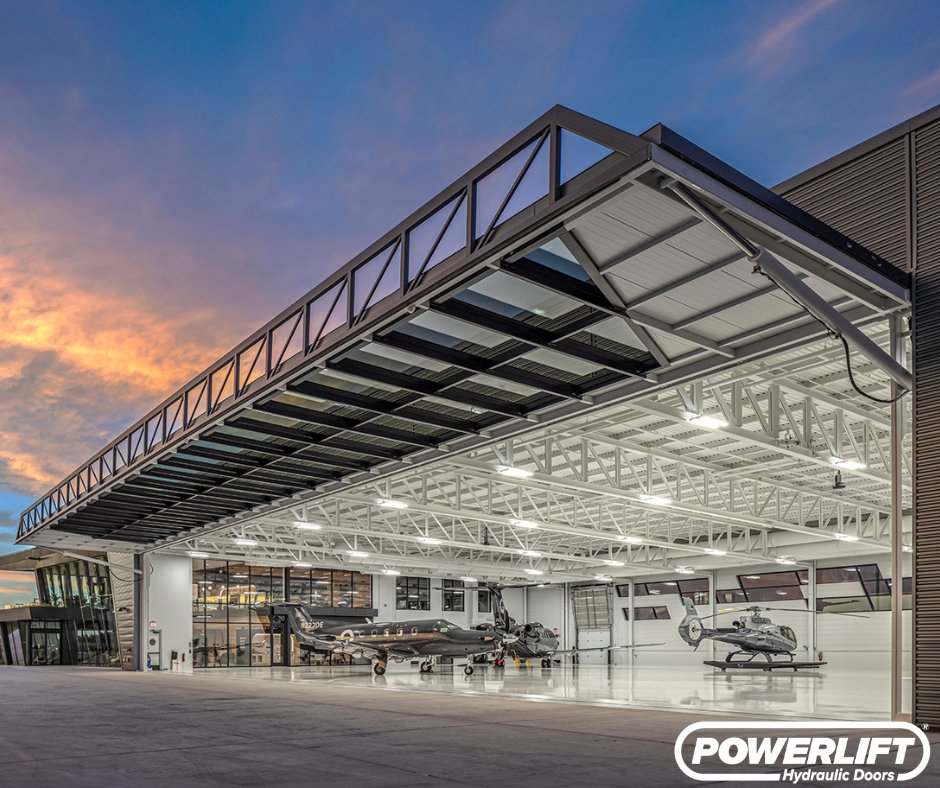 DoorsPowerlift's tweet photo. This massive 118' x 23' PowerLift Hydraulic Door delivers both scale and style for Otter Air Services in Grand Rapids, Michigan. Designed to provide full, unobstructed access while doubling as a striking architectural feature, this hangar door performs just as impressively as it looks.

From sunrise reflections to a fully open hangar ready for action, this door transforms the entire space.

Completed by PowerLift Doors of Michigan, bringing strength, precision, and craftsmanship to every project.

Looking to upgrade your hangar? Let’s make it happen.

#PowerLiftDoors #AircraftHangar #Aviation #HydraulicDoor #Michigan #OtterAirServices #BuiltByPowerLift