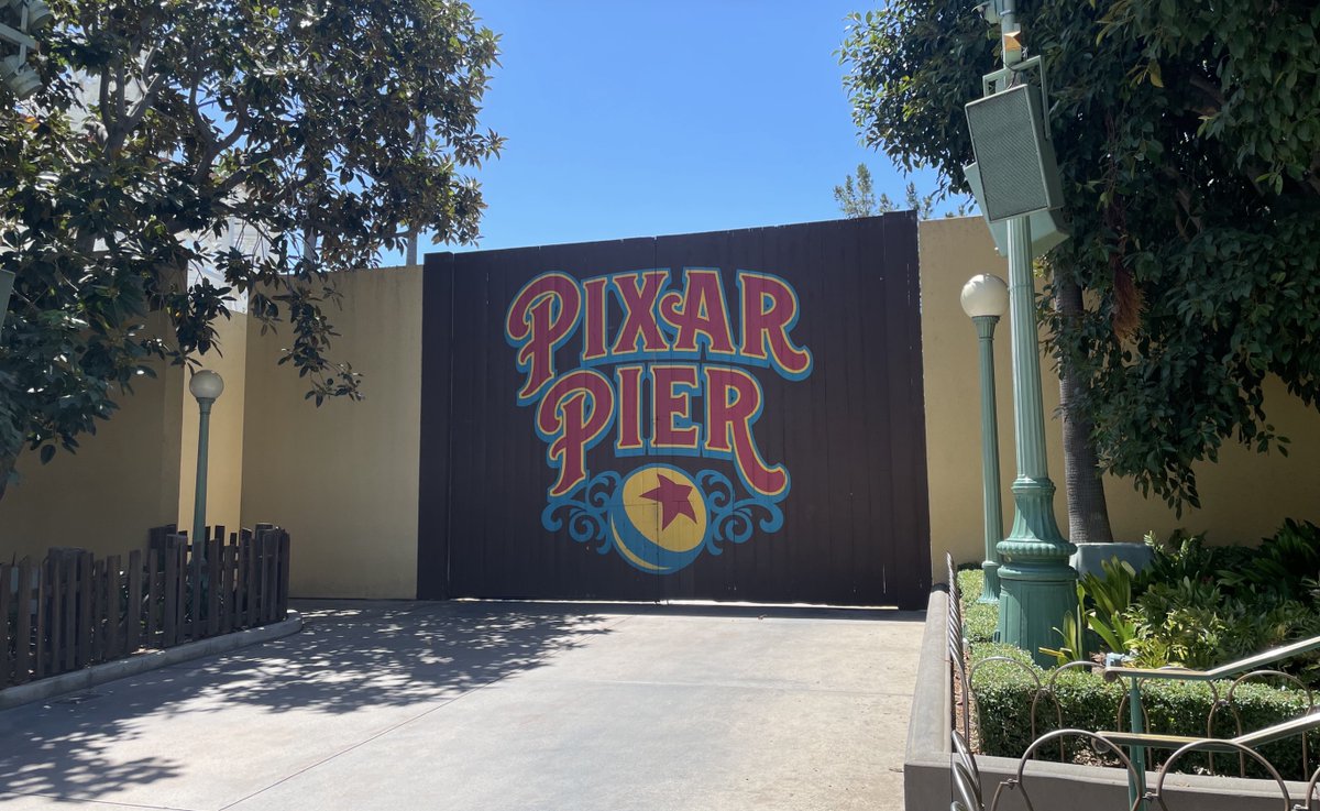 JimShull's tweet image. #Coco show building looks to be compact entered through this gate.  The back stage buildings will likely stay resulting in a small footprint for what promises to be a popular family ride.  DCA simply doesn’t have expansion room for a major ride on #PixarPier