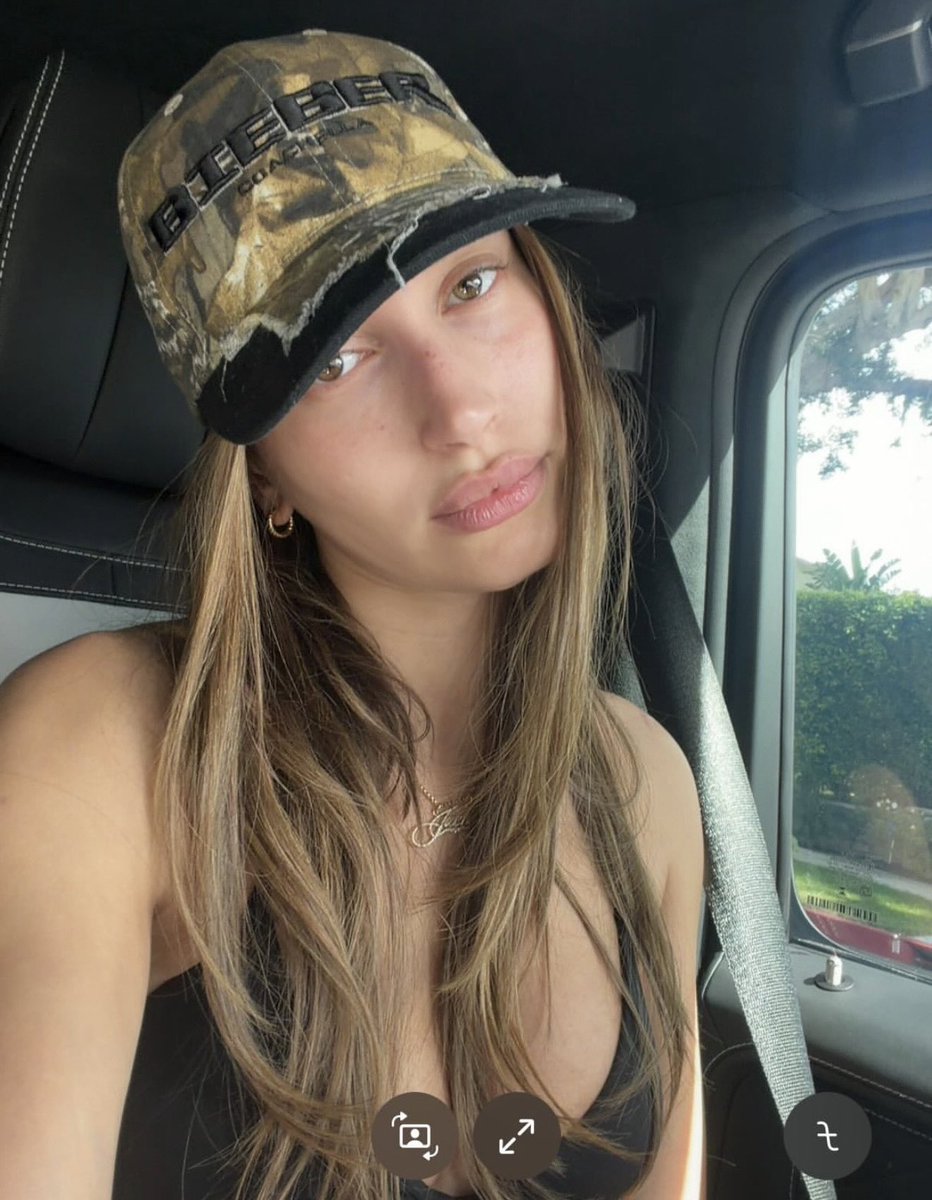 JustinsTourNews's tweet photo. Hailey Bieber teases #Bieberchella merch. 🤏 https://t.co/P3Qxoe8GVp