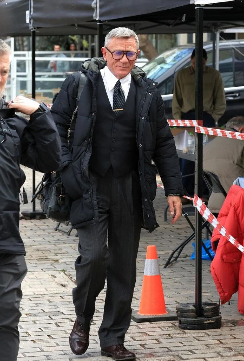DanielCraigUPD's tweet photo. Daniel Craig arrives on the set of Damien Chazelle’s untitled prison drama in Athens 🇬🇷 on Thursday, 2 April 2026. https://t.co/jRjzp8M60C