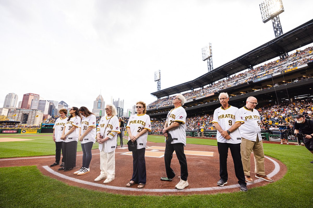 Pirates's tweet photo. Members of the Dave Giusti, Elroy Face, and Bill Mazeroski families joined us on the field pregame as we remembered former Pirates we lost this past year. 🖤💛 https://t.co/mBAc4fkUs9