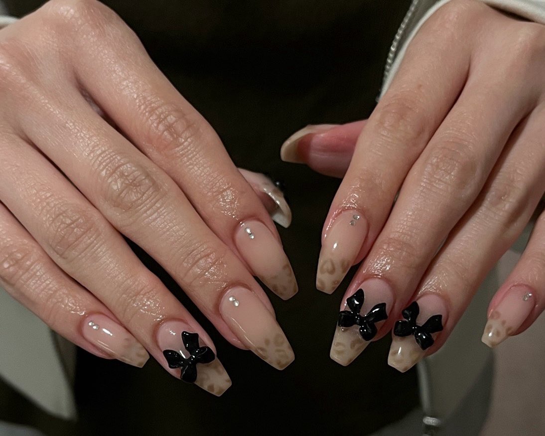 nnyr_'s tweet photo. NINGNING nail💅🐆🖤 https://t.co/WiCJWbVmX8