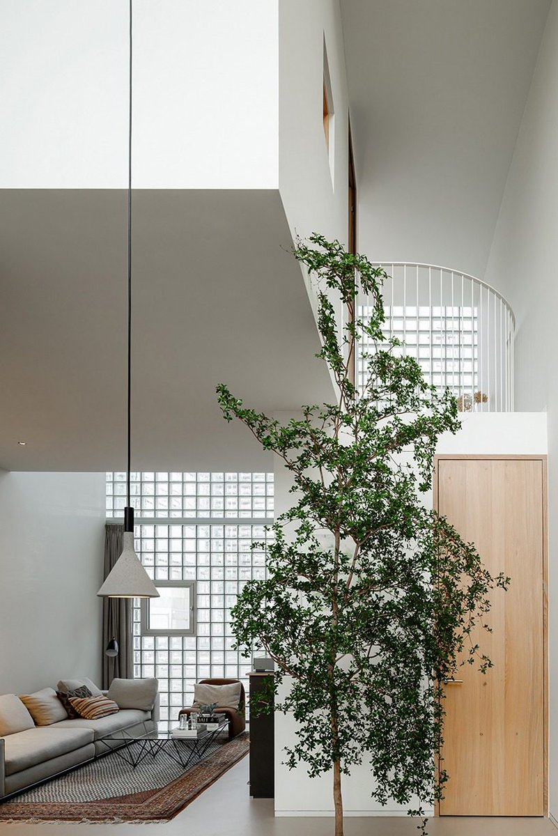 designboom's tweet image. glass block facade wraps studioninedots’ playfully stacked box residence in #amsterdam designboom.com/architecture/g…