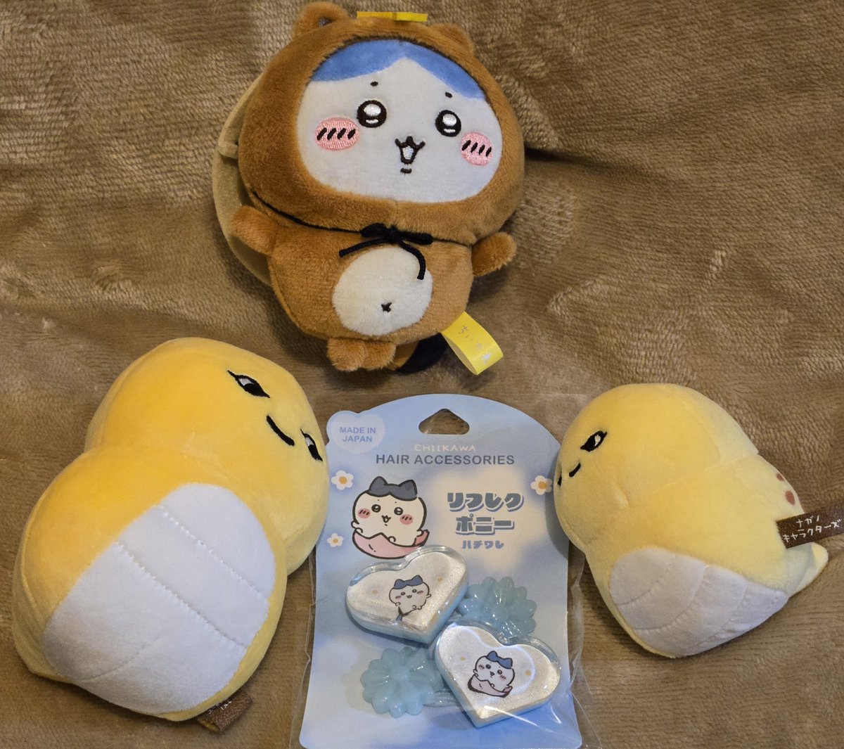 imo_imoooo's tweet photo. 今日のちい活
西友にハチワレちゃんリフレクターあったので買ってしまいました
髪には可愛すぎて付けられないからバッグに🫶
#ニセツチノコ
#ちいかわ https://t.co/KKpxyajQGN