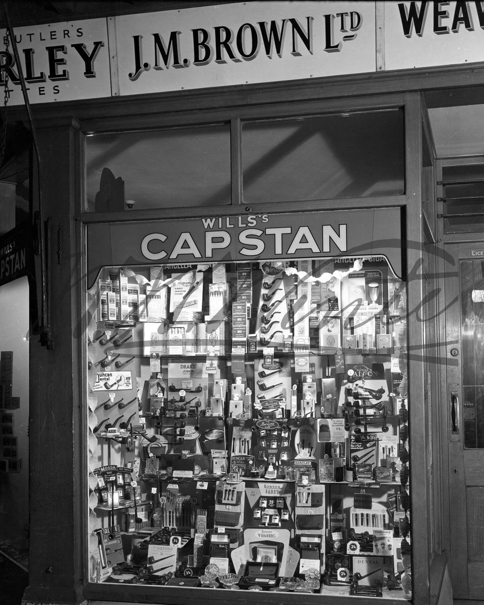 The window of J M Brown Ltd featuring a display of pipes and smoking paraphernalia.
#Winters1852 #WWWinterHeritageTrust #WWWinterLtd #ShopFront