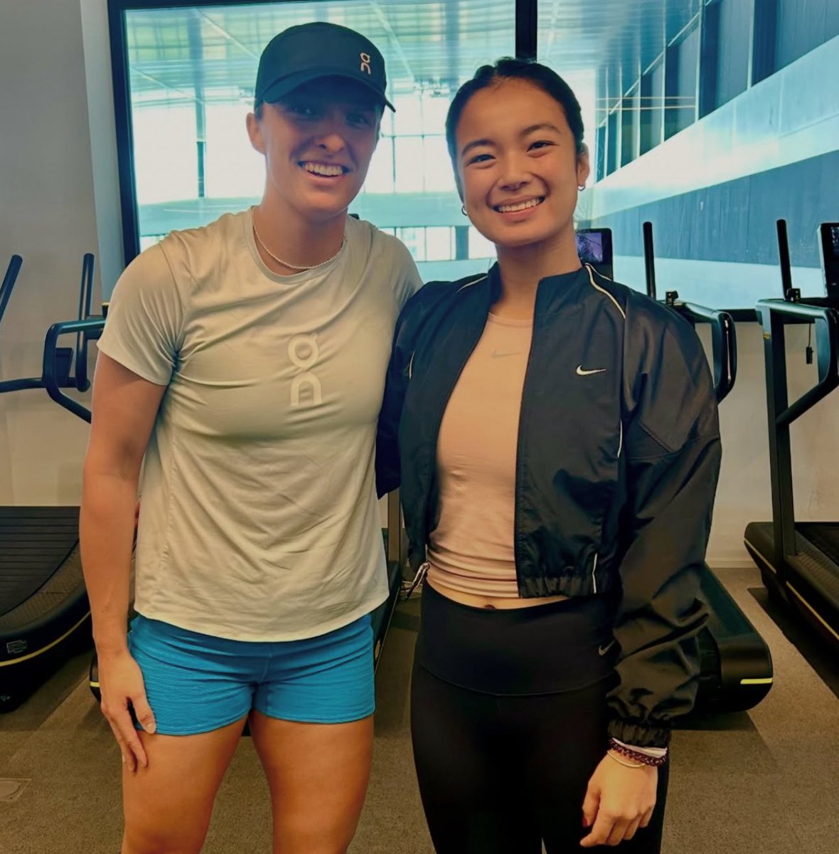 DYANCASTILLEJO's tweet photo. Iga Swiatek and Alex Eala reunited at the Rafa Nadal Academy!

They posted their current photo with a throwback photo from Alex’s graduation 🎾 

📸 RNA IG https://t.co/yvltROhDp1