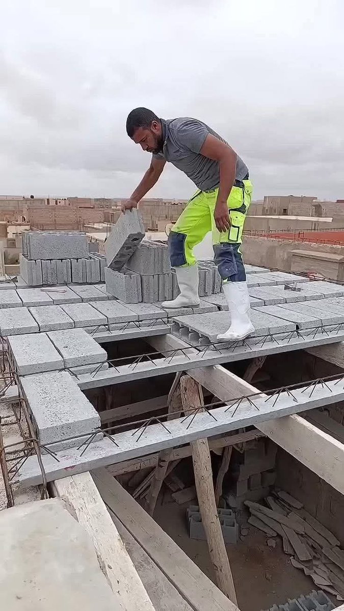 Ribbed Slabs (Block &amp; Beam System), An Alternative to the Conventional Solid Slab

If you’ve ever seen a building under construction where hollow blocks are laid between precast concrete beams before a final concrete topping is poured, you’ve witnessed a ribbed slab system in