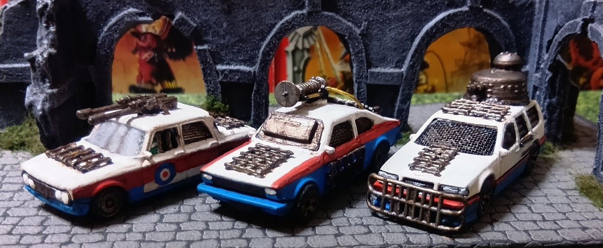 davidlee74's tweet photo. I have completed a fourth Gaslands team.  I am not keeping this one, it is a gift for a friend, but I am definitely going to face it on the racetrack.  I tried a few new things when doing these, the shattered front windscreen, and hand painting the roundels. https://t.co/FHKmqyE79w