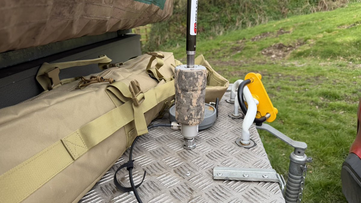 M0IAX's tweet photo. Today I added a mount for my MPAS 2.0 on my camping trailer. Seems to work quite well on JS8Call 7 and 20m and Vara Winlink on 30m. It is very windy here today which is why I was sat in the car and not at the back of the trailer which will be the preferred operating position if we get some sunshine. Winlink with Vara running in Crossover and JS8Call for MacOS all running quite happily on my MacBook Neo.
