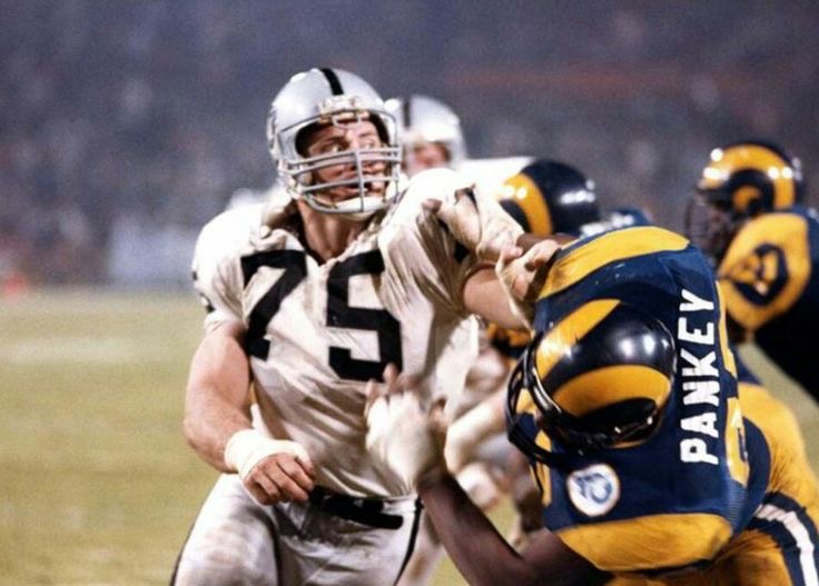 Howie Long just throwing around grown men. #RaiderNation