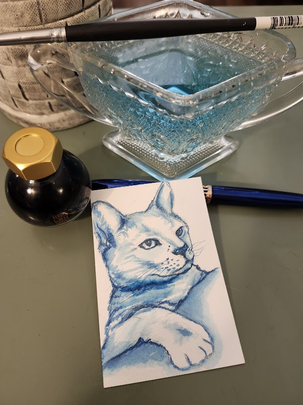 EvaIn280's tweet photo. New @FWPStationery ink, new painting. This is my boy Otto, in Valiant Blue. There's a gentle green-gold shimmer to it that's especially lovely in writing. https://t.co/o0JzyJGSlM