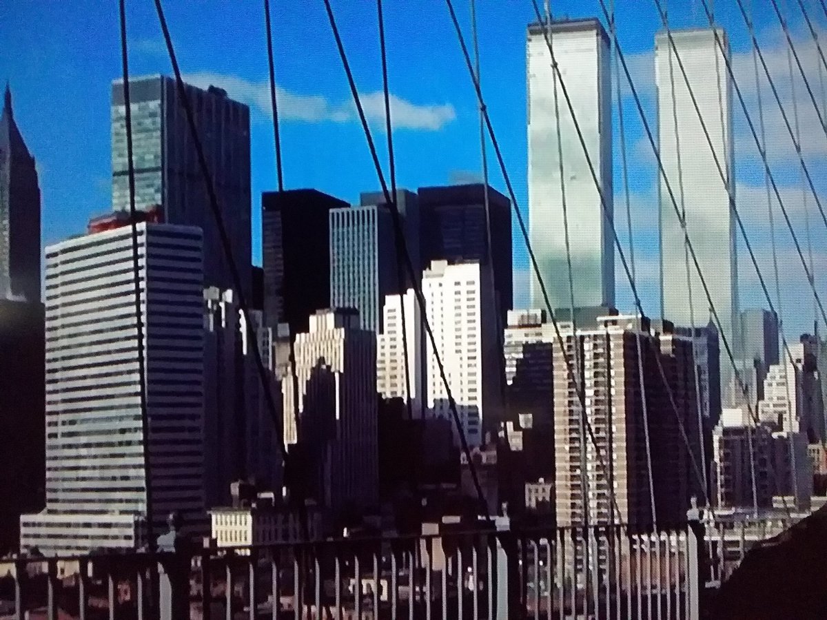TCMCult's tweet photo. The opening scene of #Godspell (1973) shows the New York City skyline with the view of the newly constructed #WorldTradeCenter towers in the background as the sound of a high speed jet passes by. 
A chilling premonition of things to come. 
#TCMParty #Easter #NewYork https://t.co/Qm0Dl2rDc5
