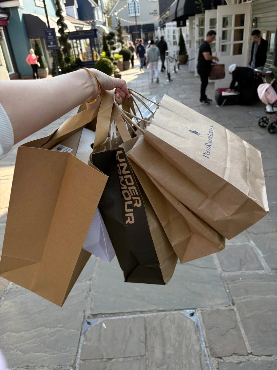 Retail therapy level: Expert 👕🛍️ Scored Under Armour kicks, Polo sweaters, and more on this sunny street haul! #ShoppingSpree #NewGear
