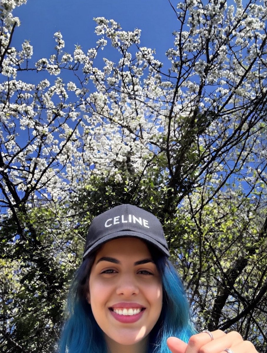 Crypto_Queen131's tweet photo. 🌸 CÉLINE cap under exploding cherry blossoms… spring hitting DIFFERENT! 💙🧢

Blue hair, biggest smile, pure Genève magic ☀️

Who else is obsessed with cherry blossom season right now? 

Drop your city 👇

#Celine #CherryBlossom #Geneva #SpringVibes #LuxuryStyle https://t.co/i8rqCDe4tp