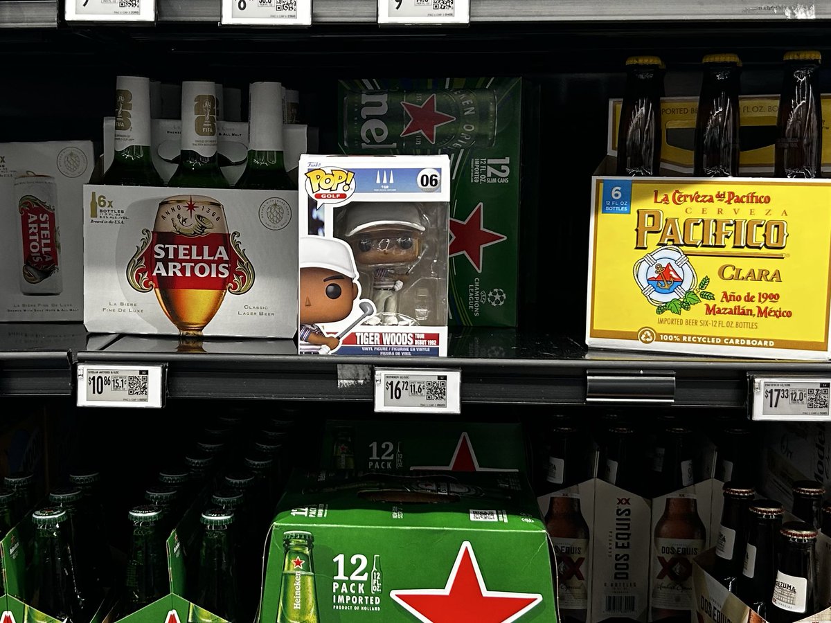 Somebody put a Tiger Woods funko pop by the beer at Walmart😂