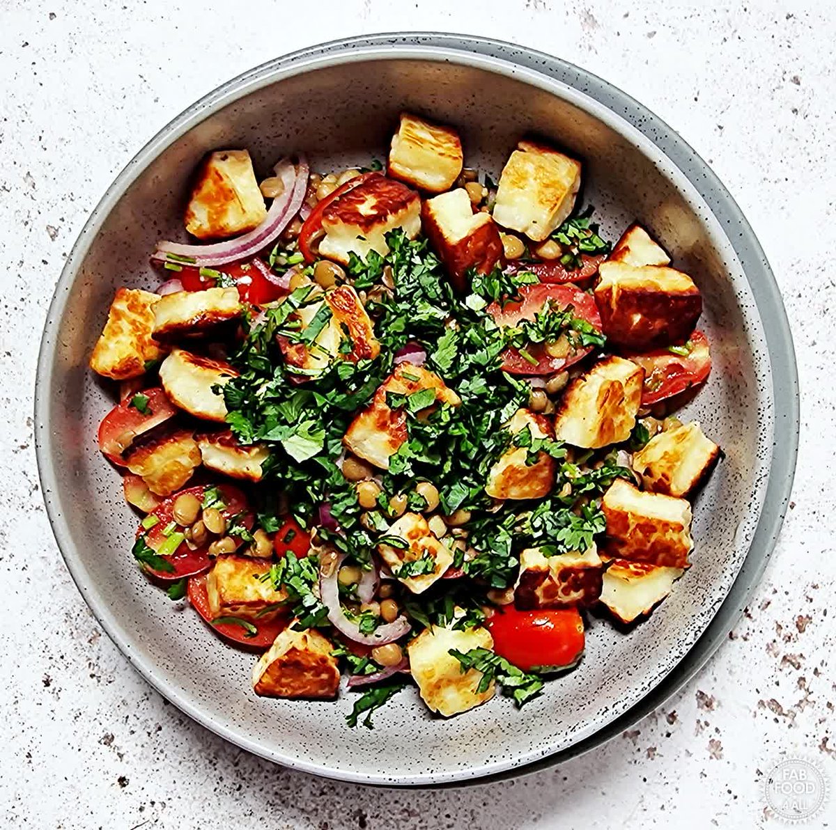 FabFood4All's tweet image. Warm Lentil, Cherry Tomato, and Halloumi Salad is a quick &amp;amp; delicious. Think green lentils, cherry tomatoes, coriander (cilantro) and red onion in a lemon dressing topped with pan-fried halloumi. fabfood4all.co.uk/warm-lentil-ch… #warmsalad #halloumi #lentils #vegetarian