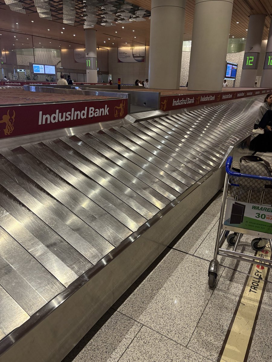vikrams69's tweet photo. Landed at 1755 ..parked at bay V 30 , it’s 1850 hrs and not even one baggage arrived at Belt no 12 ,CSIA ,Air India was better prior to privatisation services have declined and service quality is at it’s worst @MoCA_GoI @PMOIndia @DGCAIndia @airindia @jeet_adani1 @mumbai_airport https://t.co/JJELR1olrf