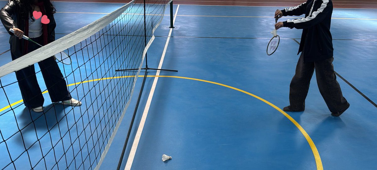 🏸