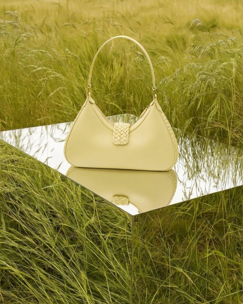 AranyaniRetail's tweet photo. Our signature silhouette, Velora, arrives in a spring-toned lemongrass hue with its hand-pleated detailing. 

Discover this elevated shoulder bag at our Mayfair boutique. https://t.co/HbpkcxyRbK