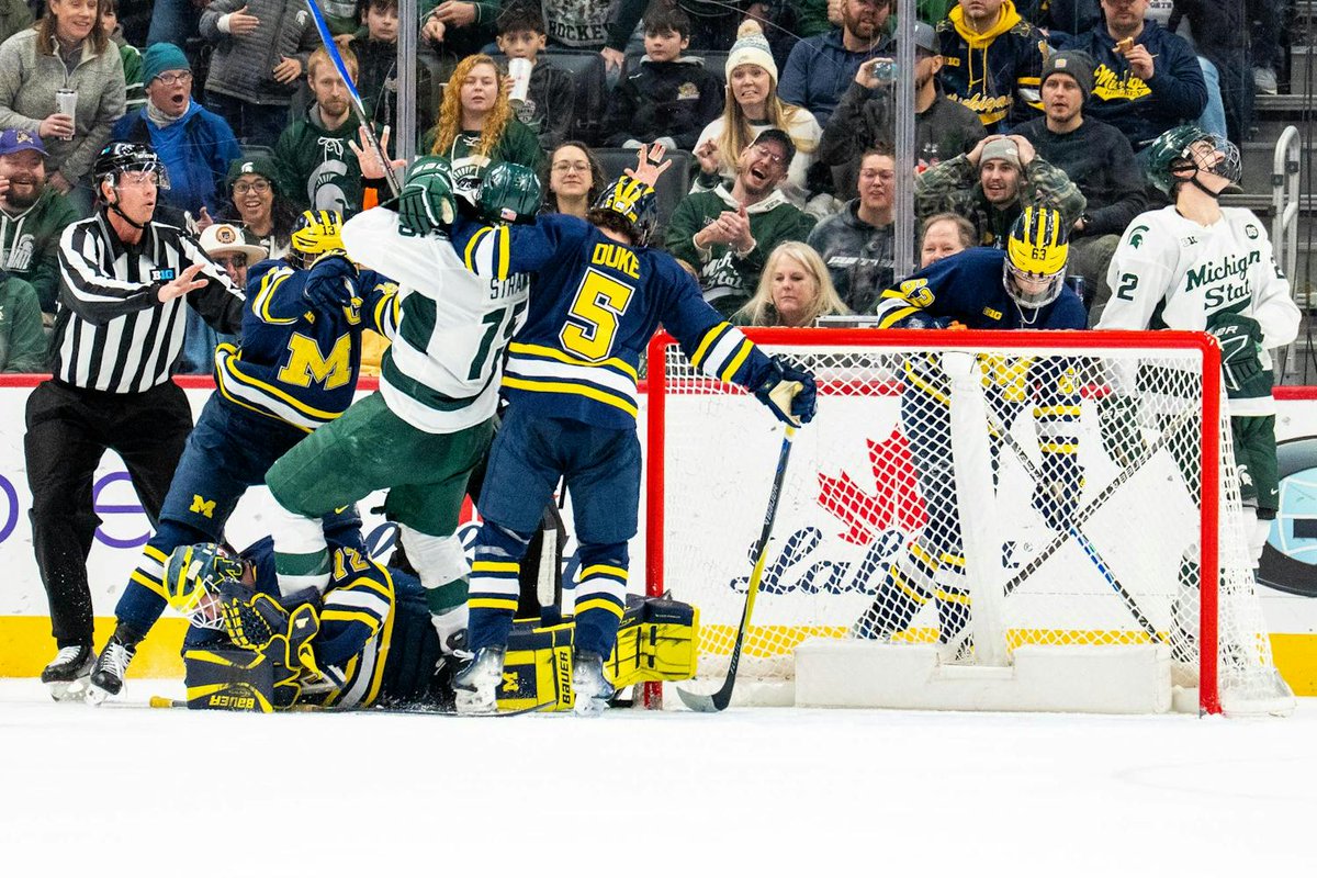 spartykids's tweet photo. I spy with my little eye..... my wife at the net (not looking too excited) ... which is unusual for her while watching our Michigan State Spartans! #DualintheD #MSUHockey https://t.co/eD8TRYwARX