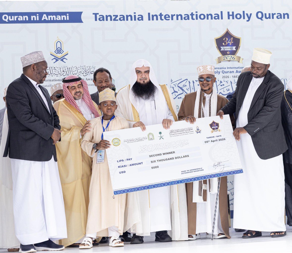 Saudi_MoiaEN's tweet photo. The 34th edition of the Tanzania International Quran Competition concluded in the capital, Dares Salaam, with participation from 26 countries and an audience exceeding 60,000 attendees, under the patronage and support of the Ministry of #Islamic_Affairs.

His Excellency Minister Dr. Abdullatif Al Alsheikh affirmed, through a speech delivered on his behalf, the Kingdom’s commitment to serving the Holy Quran, supporting Quranic competitions, and strengthening Islamic cooperation.

At the conclusion of the ceremony, the winners of the top positions were honored.

News details:
https://t.co/FEiFXCbuHq