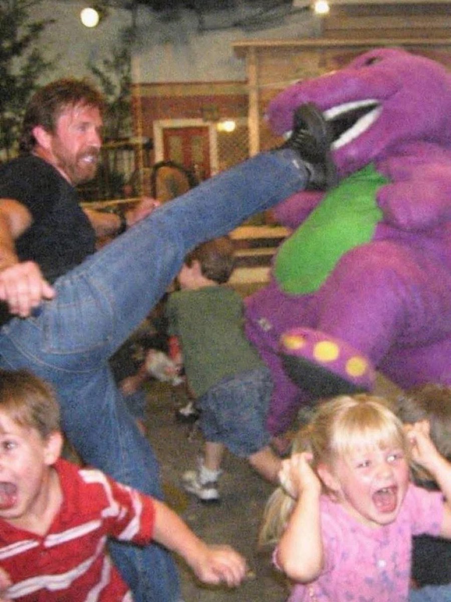 CardeeMauley's tweet photo. It’s Easter so never forget Chuck Norris vs Barney 😂😂😂 #Easter https://t.co/2tcnDgvJSp
