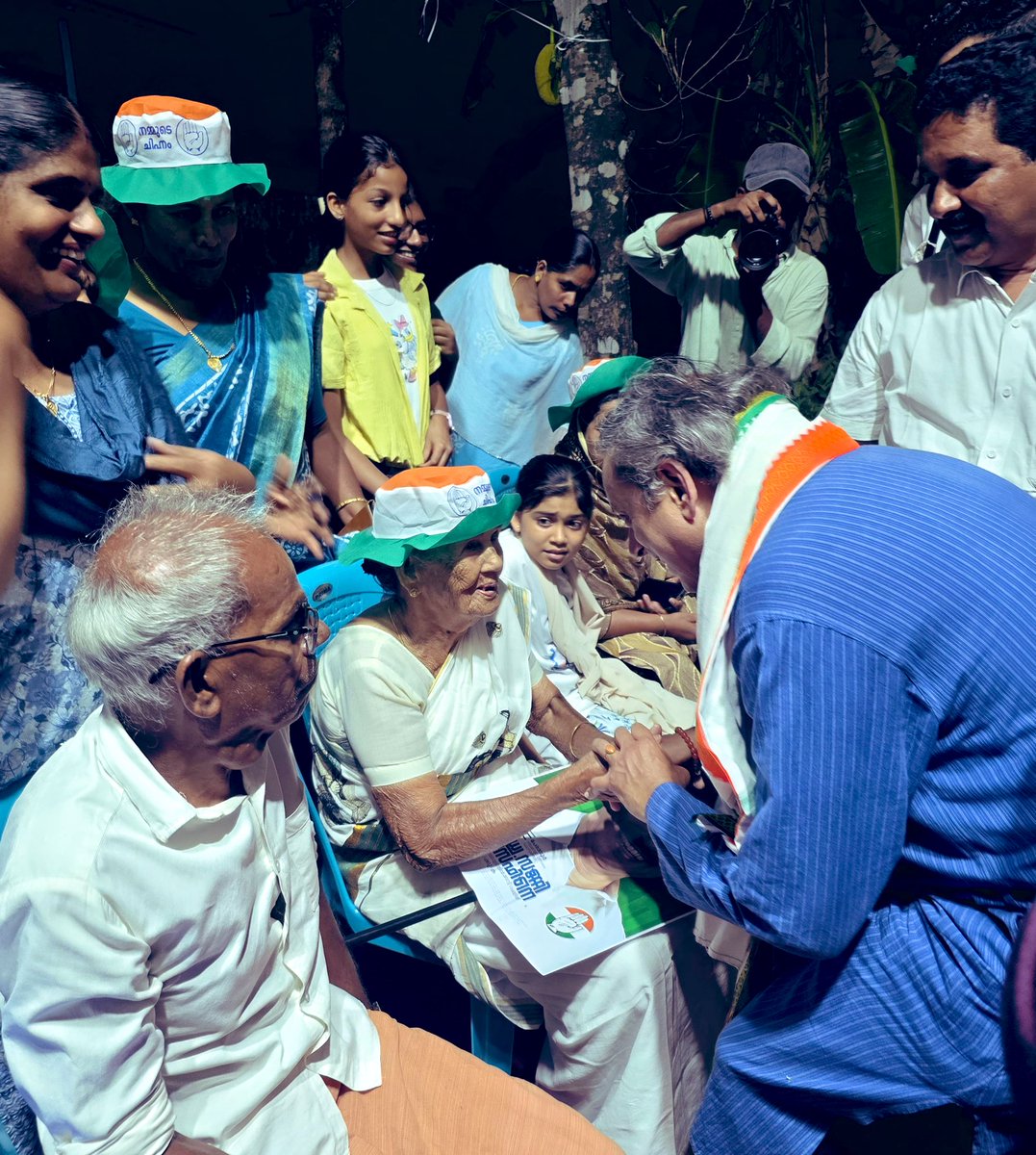 ShashiTharoor's tweet photo. Spotted this remarkable 88-year-old lady in the crowd waiting patiently for us to speak. Went down from the stage to enquire about her well-being and seek her blessings for our candidate. Such loyalty is what @incIndia is built on. And it will take @INCKerala to victory in the #KeralaElection2026 !