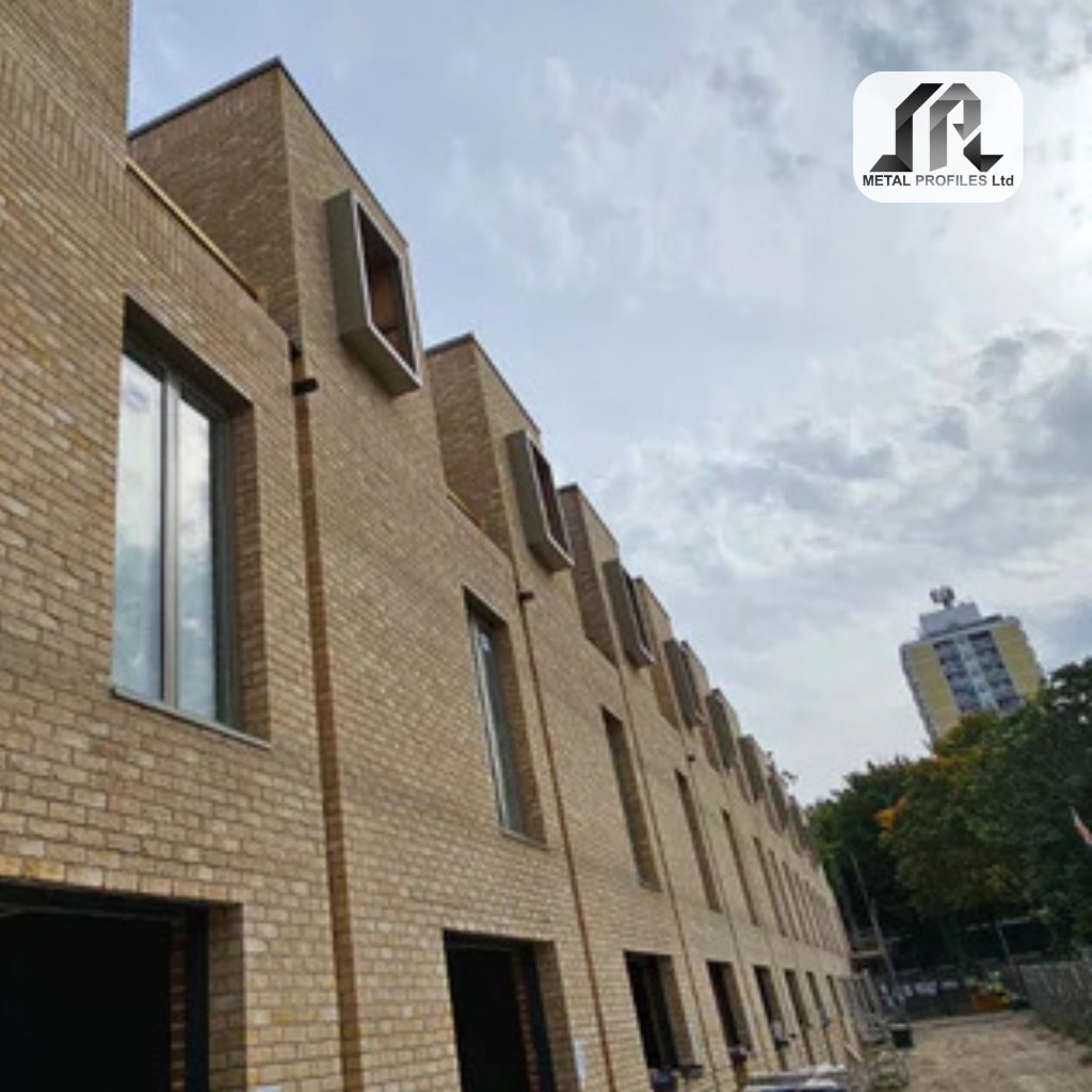 Aluminium window surround detail on a brick facade.

Clean lines around each opening.

RAL 7002 olive grey finish.

Designed for durability and a sharp look.

Made to measure for a precise fit.

#AluminiumDetail #WindowSurround #FacadeDesign #UKBuild #LondonProjects