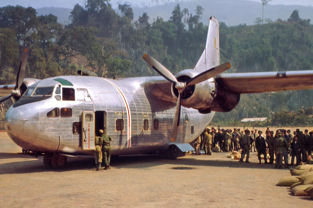 joeblillib4090's tweet photo. Air America Fairchild C-123 bringing in supplies for Royal Laotian Army troops at Long Tien. https://t.co/eQWMJoiulI